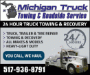 MICHIGAN TRUCK TOWING & ROADSIDE SERVICE logo