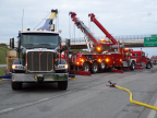 The A-1 World Truck Towing & Recovery service vehicle A photo of the A-1 World Truck Towing & Recovery service truck