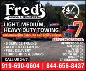 FRED'S TOWING and TRANSPORT Logo