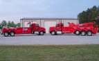 A photo of FRED'S TOWING and TRANSPORT - 919-690-0604 in action.