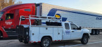 A photo of SCOTT'S REFRIGERATION TRUCK TRAILER AND TIRES in action.
