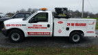 The STATE LINE INSPECTION AND REPAIR service vehicle A photo of the STATE LINE INSPECTION AND REPAIR service truck